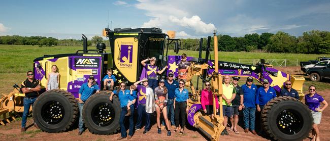 Northern Australia Civil, the company owned by Chris 'Willow' Wilson, has a grader covered in Starlight Foundation livery that will be used at the Berrimah overpass construction site to raise funds for the charity. Picture: Glenn Campbell