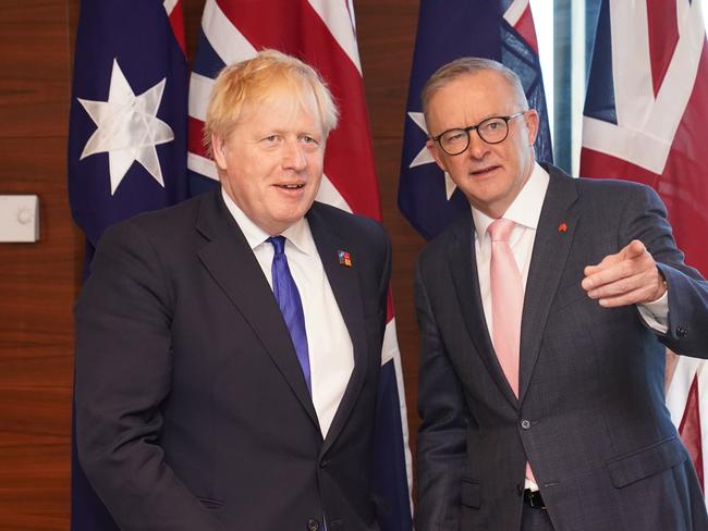 Former British Prime Minister Boris Johnson meets Australian Prime Minister Anthony Albanese during the NATO Summit in 2022 in Madrid, Spain. Photo: Getty Images.