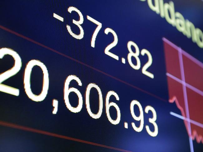 A board above the floor of the New York Stock Exchange shows the closing number for the Dow Jones industrial average, Wednesday, May 17, 2017. Stocks fell sharply as investors worried that the latest turmoil in Washington could hinder President Donald Trump's pro-business agenda. The steep drop Wednesday was the market's worst since September and ended an unusually long period of calm. (AP Photo/Richard Drew)