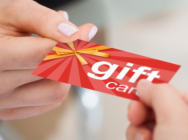 Woman using a gift card to pay. Picture: iStock.