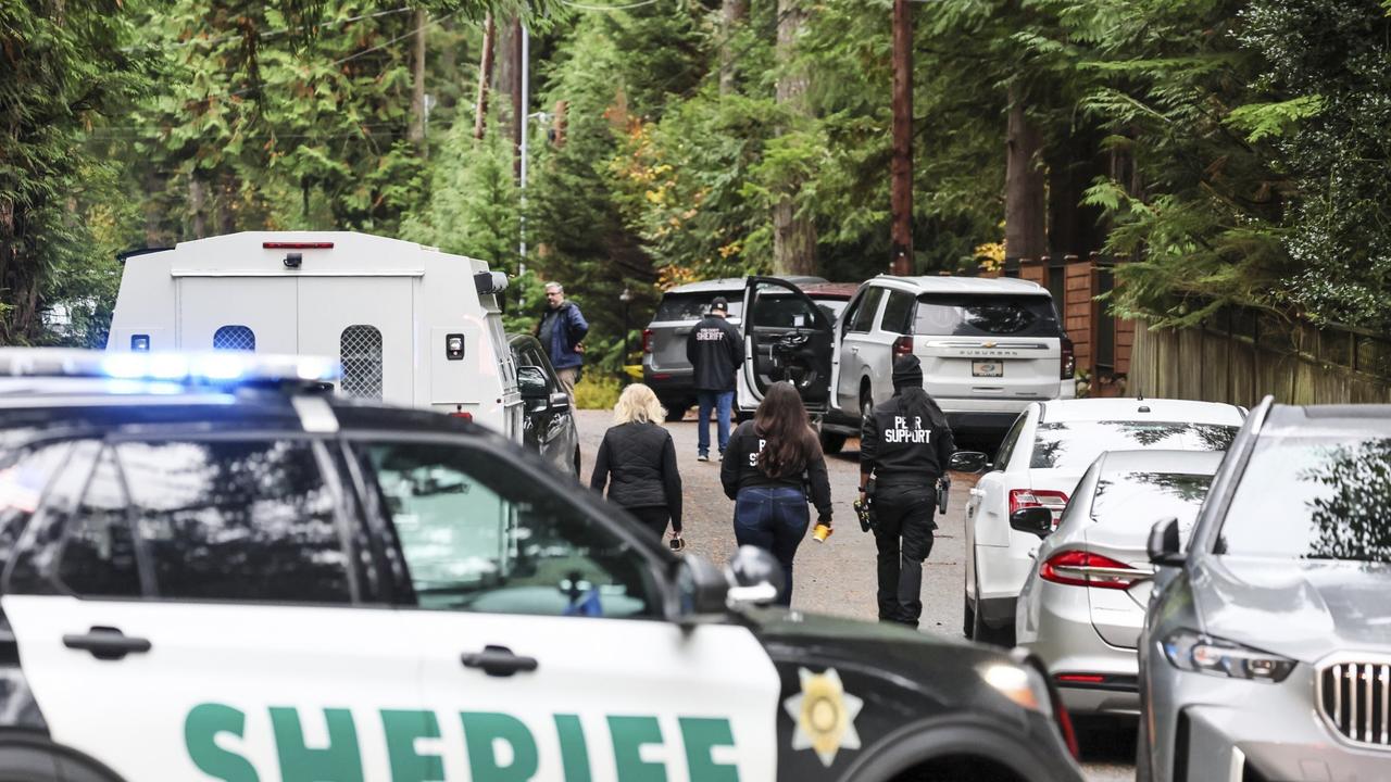 Police arrive on the scene of the shooting in Fall City, Washington. Picture: Kevin Clark/The Seattle Times via AP