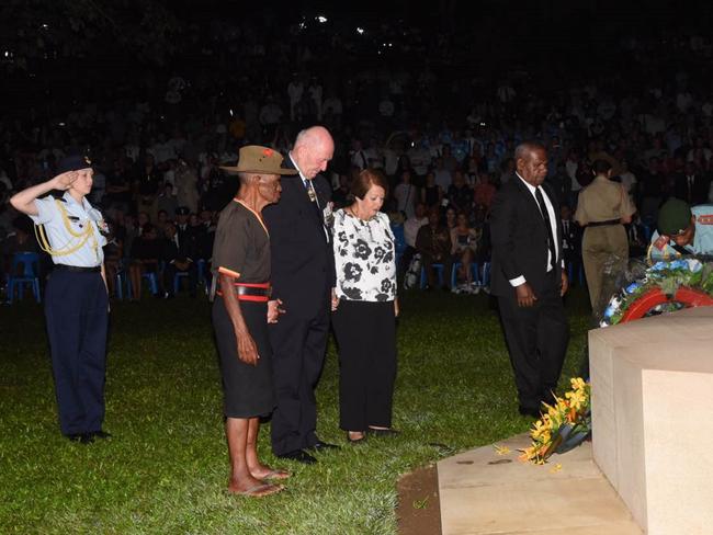 Governor-General Sir Peter Cosgrove, his wife Lynne and one of the last surviving Fuzzy Wuzzy Angels pay tribute in PNG. Picture: Justin Lees