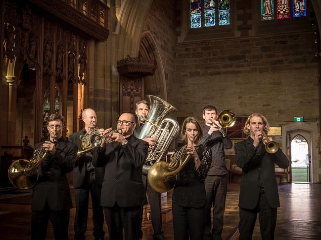 Members of the Tasmanian Symphony Orchestra’s brass section prepare to perform at St David's Cathedral in Hobart. Picture: Supplied