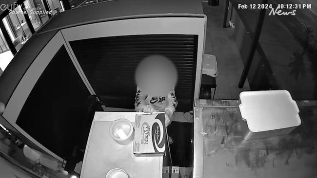 A young offender was captured on CCTV breaking into a fridge at Ascot cafe Tribe Coffee Co. Picture: Supplied