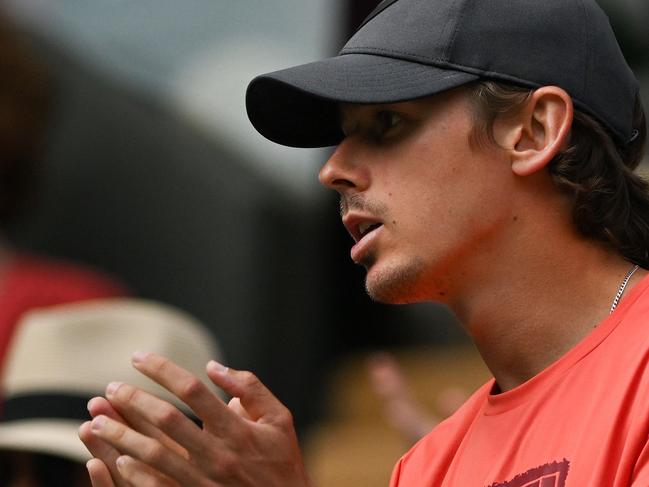 de Minaur applauds his partner Britain's Katie Boulter during her day four match at Wimbledon. Picture: Glyn Kirk / AFP