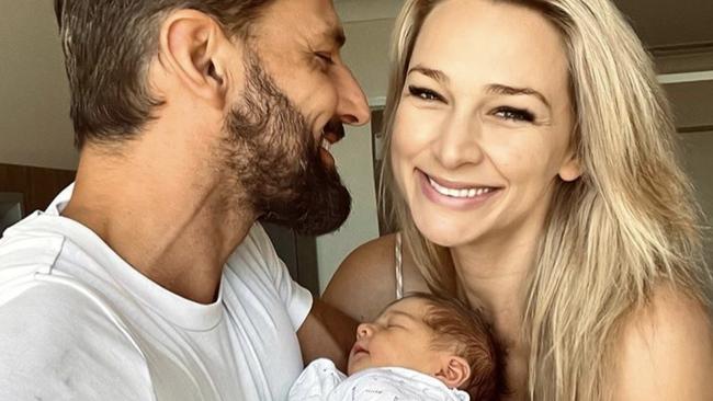 Tim Robards and Anna Heinrich with baby daughter Elle in November.