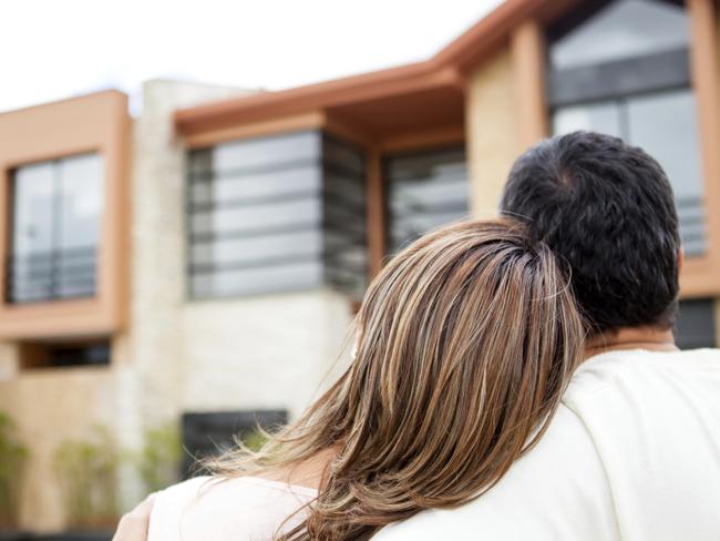 Young couple looking at a house. Picture: THINKSTOCK