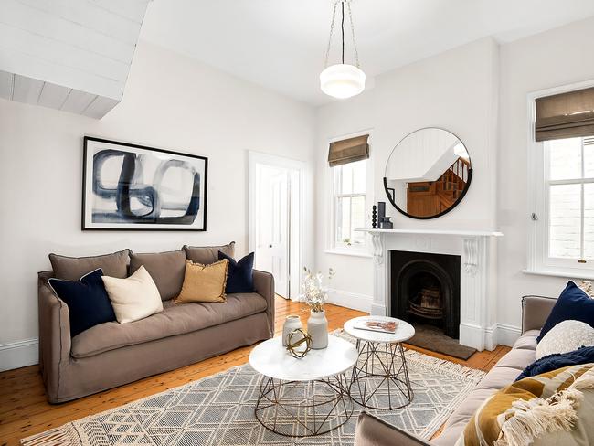 The formal living room has a fireplace.