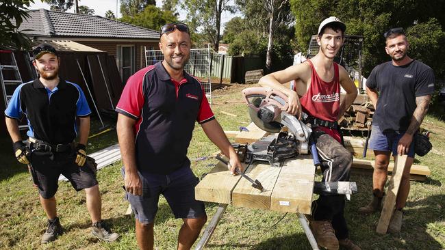 Taking a break on their Werrington Downs worksite, these tradies having nothing but good things to say for ScoMo. Picture: Justin Lloyd