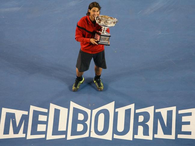 Rafael Nadal poses with his trophy after winning the 2009 Australian Open men’s singles title. Picture: AFP