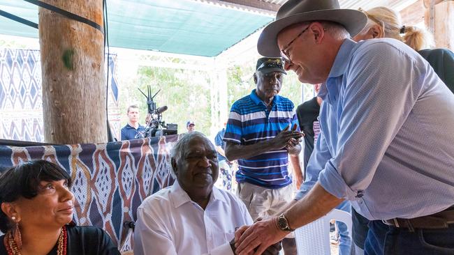 Galarrwuy Yunupingu AM interacts with Australian Prime Minister Anthony Albanese during the Garma Festival at Gulkula. Picture: Tamati Smith/ Getty Images