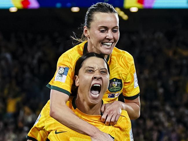 SYDNEY, AUSTRALIA - AUGUST 16: Sam Kerr of Australia (L) celebrating her goal with her teammate Hayley Raso of Australia (R) during the FIFA Women's World Cup Australia & New Zealand 2023 Semi Final match between Australia and England at Stadium Australia on August 16, 2023 in Sydney, Australia. (Photo by Daniela Porcelli/Eurasia Sport Images/Getty Images)