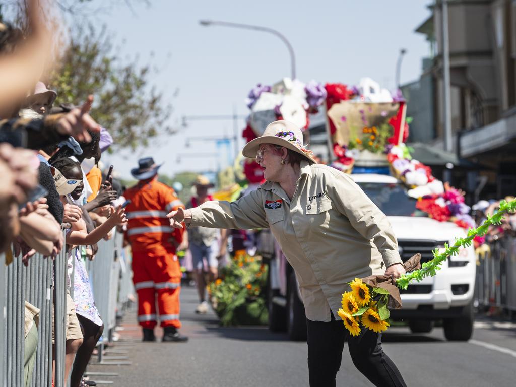 Lorelle Barr interacts with the crowd while walking with the Crows Nest Museum float at the Grand Central Floral Parade of the Carnival of Flowers, Saturday, September 21, 2024. Picture: Kevin Farmer