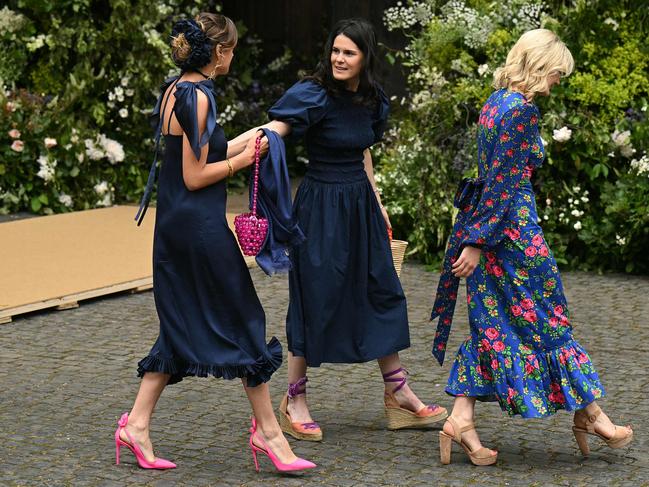 More guests arrive at the society wedding of the year. Picture: Oli Scarff/AFP