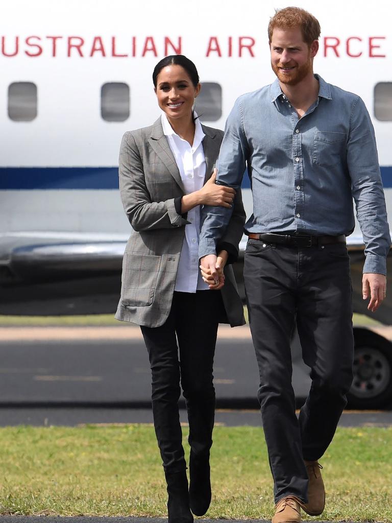 Prince Harry and Meghan arrive in Dubbo, where she took a couple of breathers. Picture: Dean Lewins