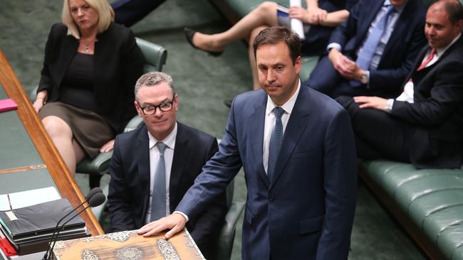 Steve Ciobo apologises after being absent from the vote as the government’s Leader in the House Christopher Pyne looks on. Picture: Kym Smith