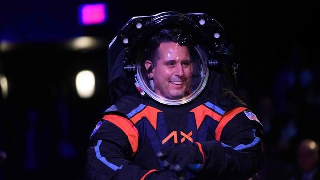 Chief Engineer Jim Stein models the new spacesuit. Picture: AFP