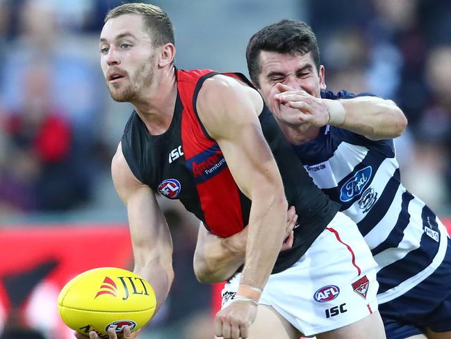 GEELONG, AUSTRALIA - MARCH 07: Devon Smith of the Bombers runs with the ball during the 2019 JLT Community Series AFL match between the Geelong Cats and the Essendon Bombers at GMHBA Stadium on March 07, 2019 in Geelong, Australia. (Photo by Scott Barbour/Getty Images)