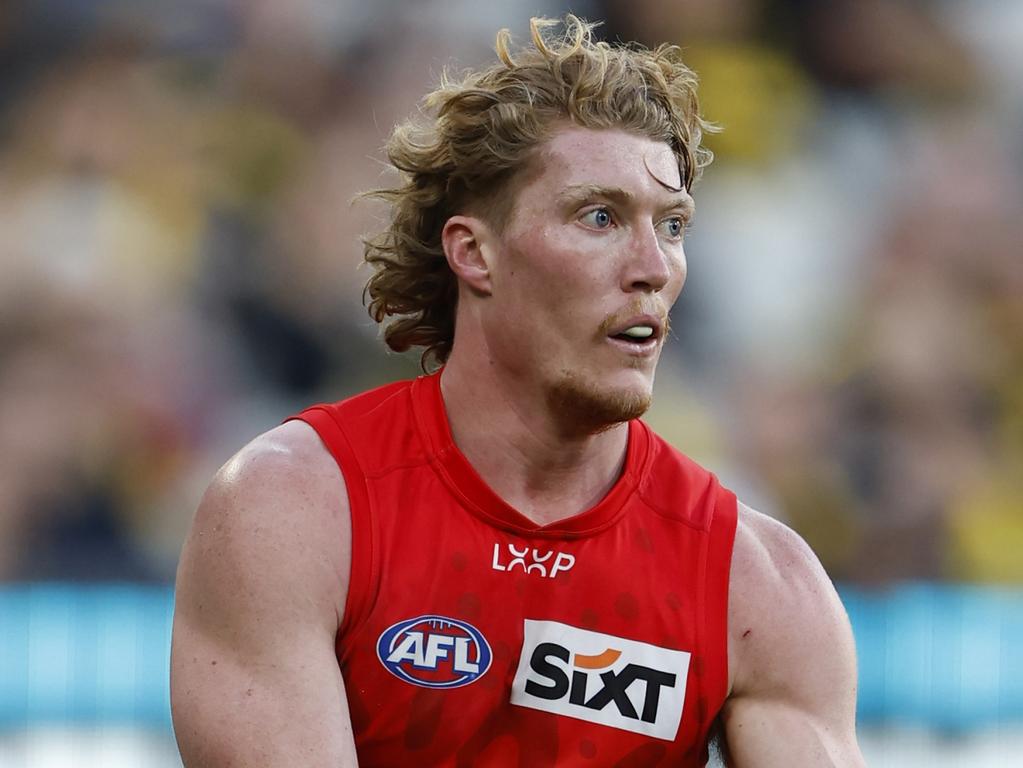 Matt Rowell of the Suns runs with the ball during the round 24 AFL match between Richmond Tigers and Gold Coast Suns. Picture: Darrian Traynor/Getty Images.