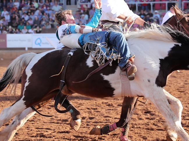 Rodeo rider Dallas Hay. Action from the Mount Isa Rodeo.  Hold for Weekend.  Pic Peter Wallis