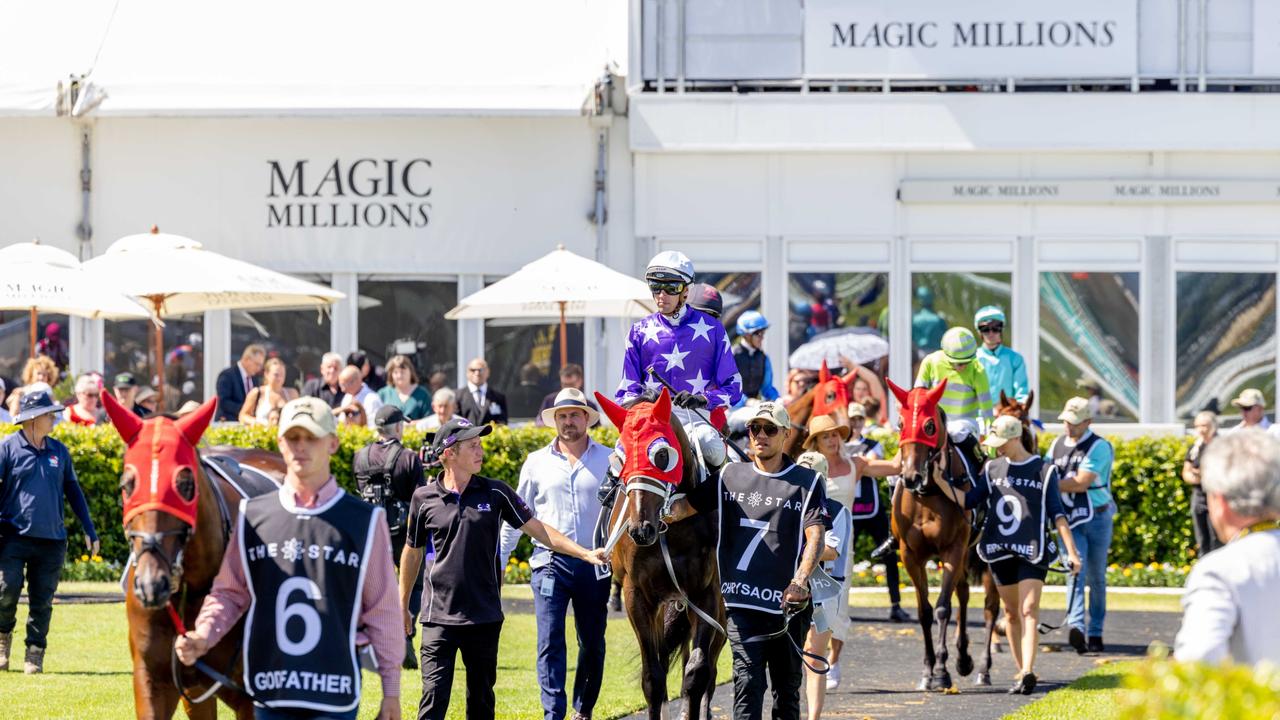 Action at Magic Millions race day. Picture: Luke Marsden.