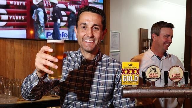 Leader of the Opposition David Crisafulli pours a beer at Chute 1 pub, Longreach. Picture: Liam Kidston.