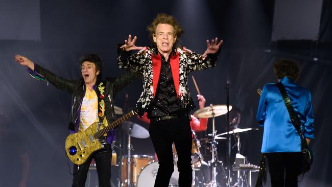 Ronnie Wood, Mick Jagger and Keith Richards of The Rolling Stones perform onstage at Hard Rock Stadium in 2019 in Miami Gardens, Florida.