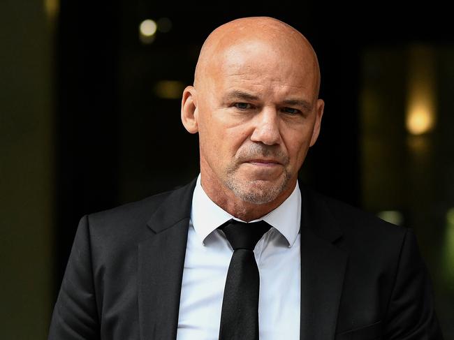 Former NSW Detective Gary Jubelin leaves the Downing Centre Local Court during break in Sydney, Tuesday, February 4, 2020. (AAP Image/Bianca De Marchi) NO ARCHIVING