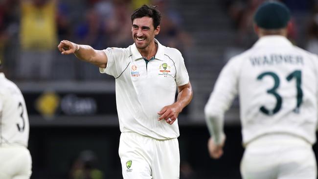 Mitchell Starc celebrates taking the wicket of New Zealand’s Neil Wagner. Picture: Getty Images