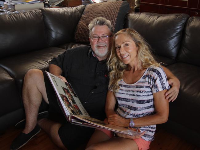 Chris and Glenys Foley peruse family photo albums. Photo: Robyne Cuerel / Fraser Coast Chronicle