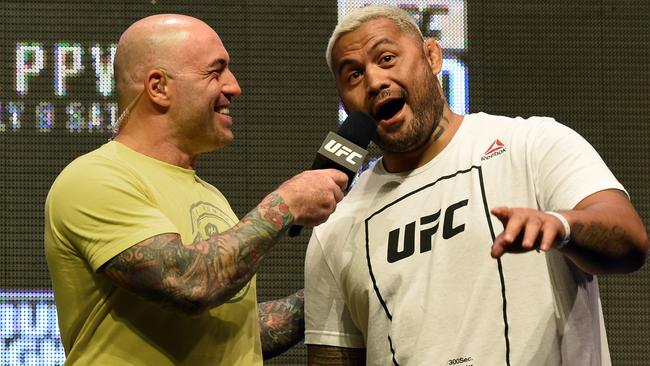 UFC Commentator Joe Rogan (L) is a big fan of smoking weed and its benefits.