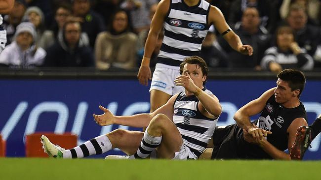 Patrick Dangerfield reacts after his tackle on Matthew Kreuzer. Picture: AAP Images