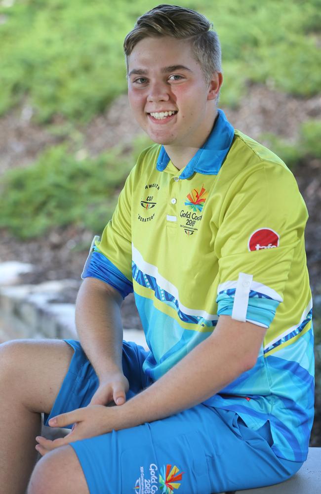 Declan Roe in his volunteer gear at his home at Robina. Picture Glenn Hampson