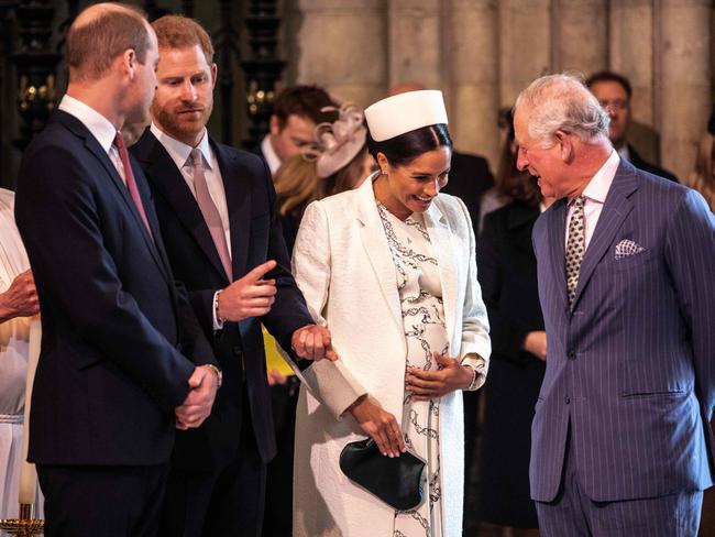 Meghan, Duchess of Sussex, talks with Prince Charles (right) as Prince William (left) and Prince Harry (second from left) look on at the Commonwealth Day service at Westminster Abbey in London on March 11, 2019. Picture: AFP