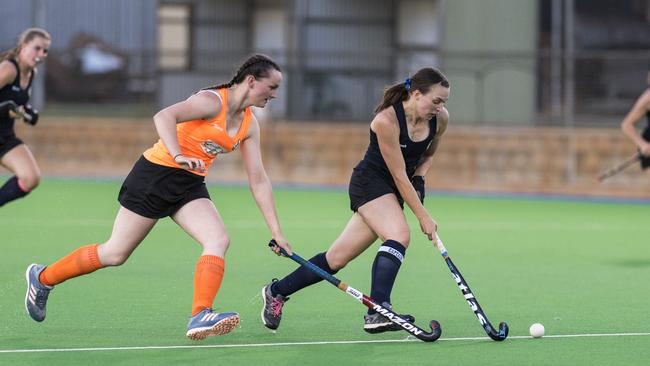 CS Vixens player Emily Payne (left) chases Stafford Strikers captain Holly Gilbar. Picture: Kevin Farmer