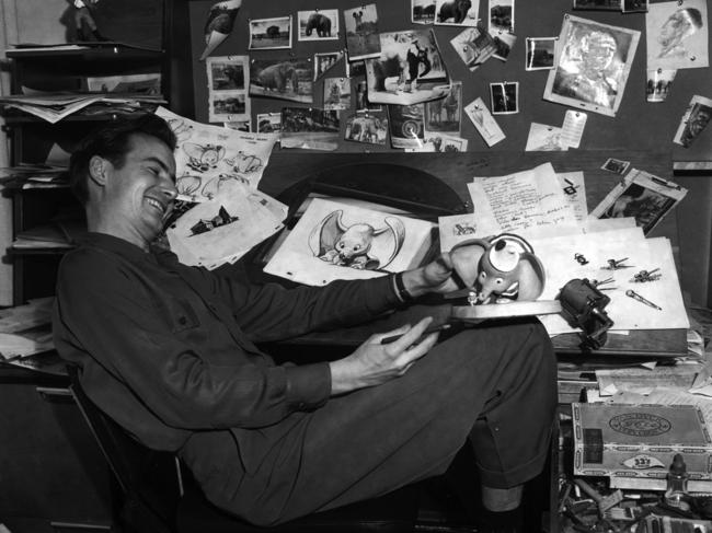 History: Artist Bill Peet working on the Disney film Dumbo in 1941. Out of copyright.