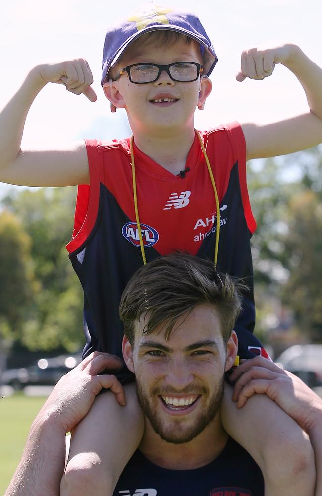 Jack Viney with nine-year-old Andrew Jeffery. Picture: Wayne Ludbey