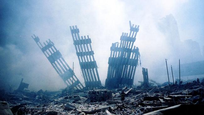 The rubble of the twin towers of the World Trade Centre smoulders on September 11, 2001. Picture: AFP