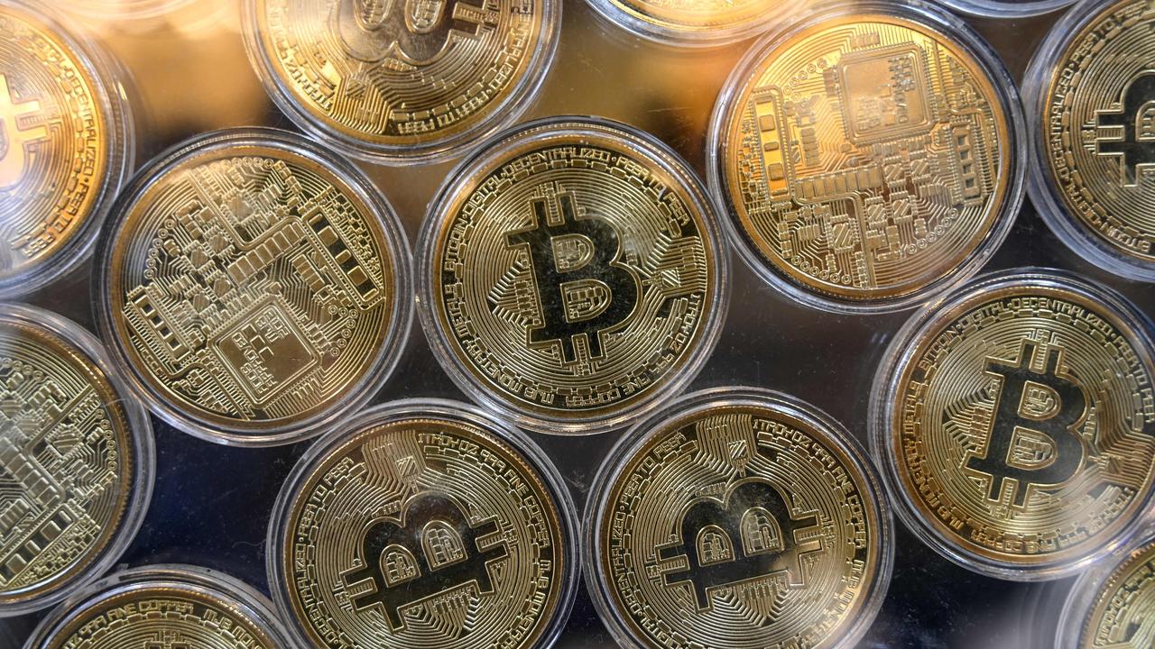 Bitcoin has fallen nearly 40 per cent in value since reaching $93,549 ($US69,000) on November 10, hovering at a near three-month low $57,755 ($US41,670) on Thursday morning. Photo by Ozan KOSE / AFP