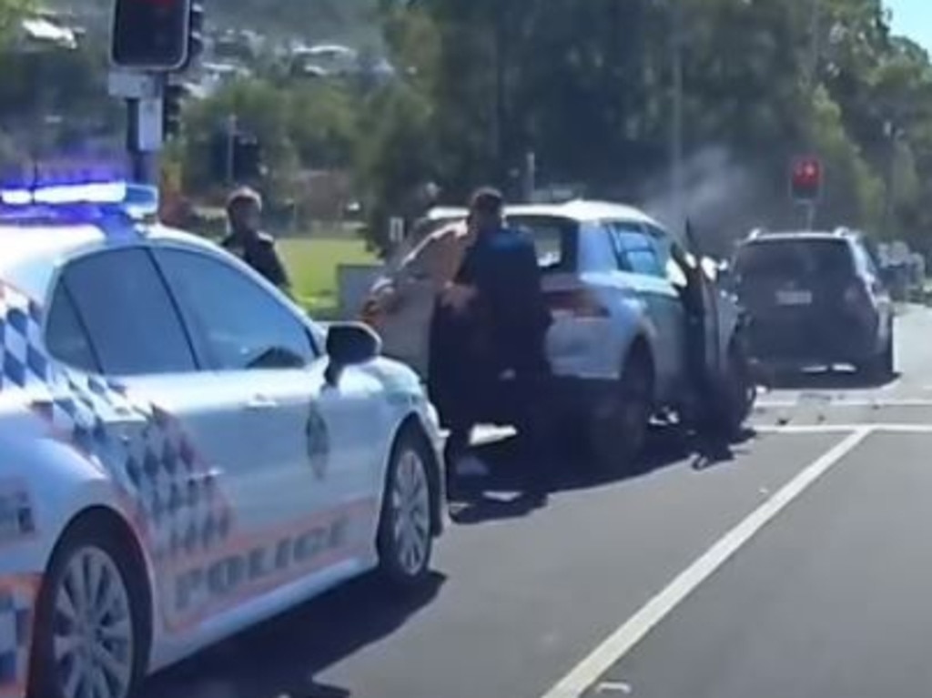 A dramatic arrest has unfolded in a busy Brisbane intersection . Picture: dashcam Owners Australia