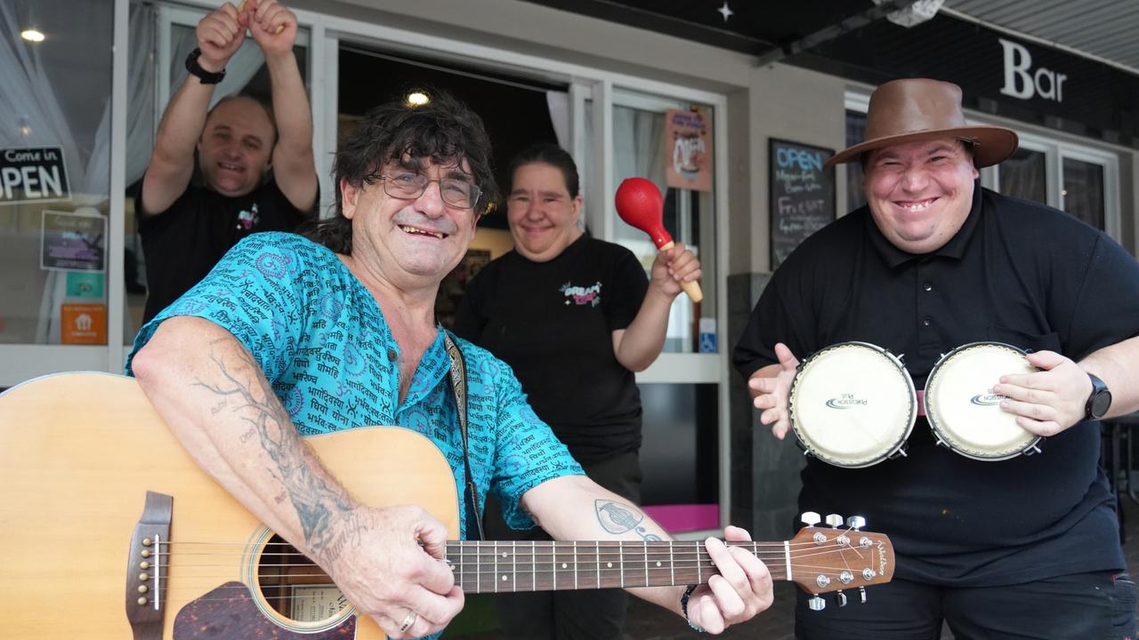 Enjoying the weekly music sessions at the Dream Cafe and Bar on Bell Street are (from left) NDIS participants Amos Spaim, Max Fitz, Jess Porter and Neil Prince.