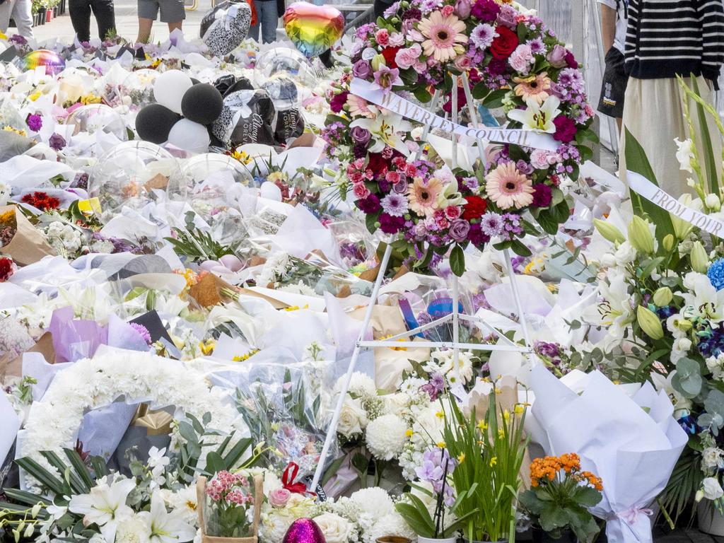 Floral tributes on Oxford St outside Westfield, Bondi Junction. Picture: NewsWire / Monique Harmer
