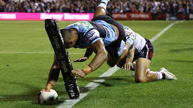 Mulitalo let his footy do the talking and came up with this incredible try to help the Sharks sneak past the Roosters. Picture: Matt King / Getty Images