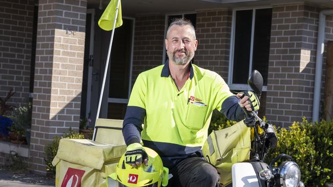 Postman Richard Pumpa has been hailed a hero for detecting a fire at a home where he was delivering mail on Tuesday. PIcture: AAP/Image Matthew Vasilescu