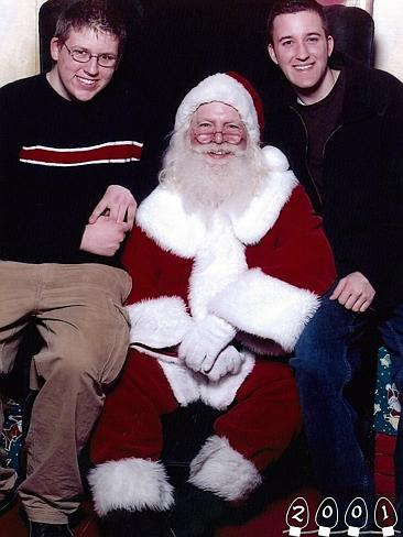 2001 ... Mike and Martin almost outgrow this Santa. Picture: Martin Gray