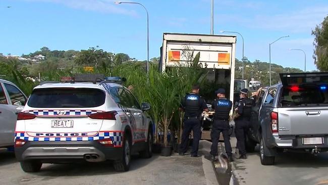 Police officers at a truck stopped in Elanora on the Gold Coast on Friday April 29, 2023, which was allegedly found to be carrying 136kg of cannabis. Picture: Nine Gold Coast News