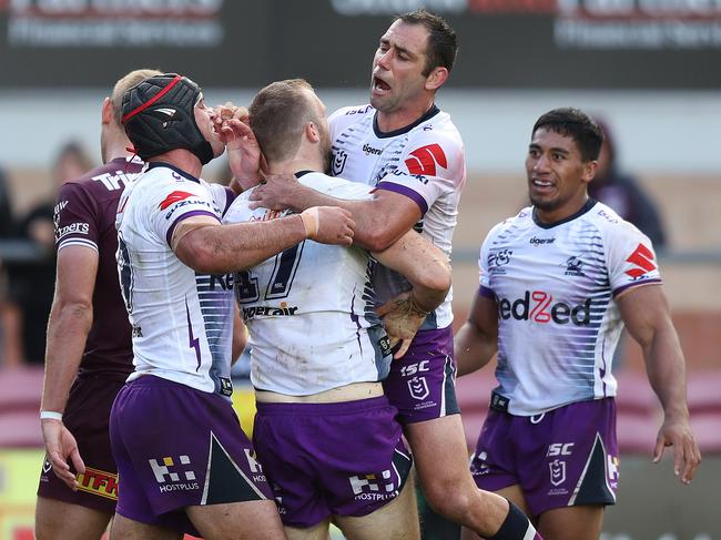 Smith celebrates a try scored by Melbourne teammate Tom Eisenhuth. Picture: Brett Costello