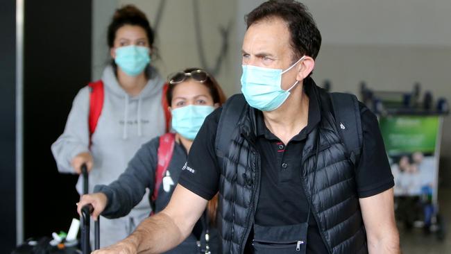 Travellers at Melbourne airport wearing masks. Picture: Stuart McEvoy/The Australian.