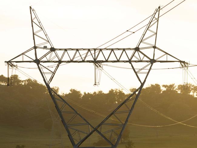 THE AUSTRALIAN. Transmission power lines near the Stubbo solar farm development. Residents of Mudgee and surrounds have concerns about a number of developments that are part of the Central-West Orana renewable energy zone. 09/02/2024. Picture by Max Mason-Hubers