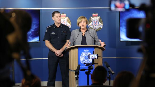 Victorian Police Minister Lisa Neville (R) and acting Chief Commissioner of Police Shane Patton hold a press conference regarding African youth crime in Melbourne, Tuesday, January 2, 2018. (AAP Image/David Crosling) NO ARCHIVING